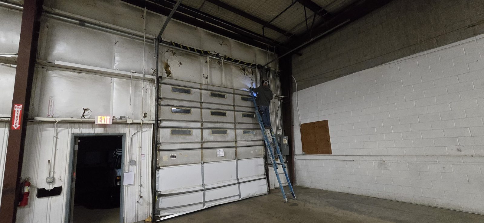 Commercial overhead door serviced by Proactive Garage Door Repair