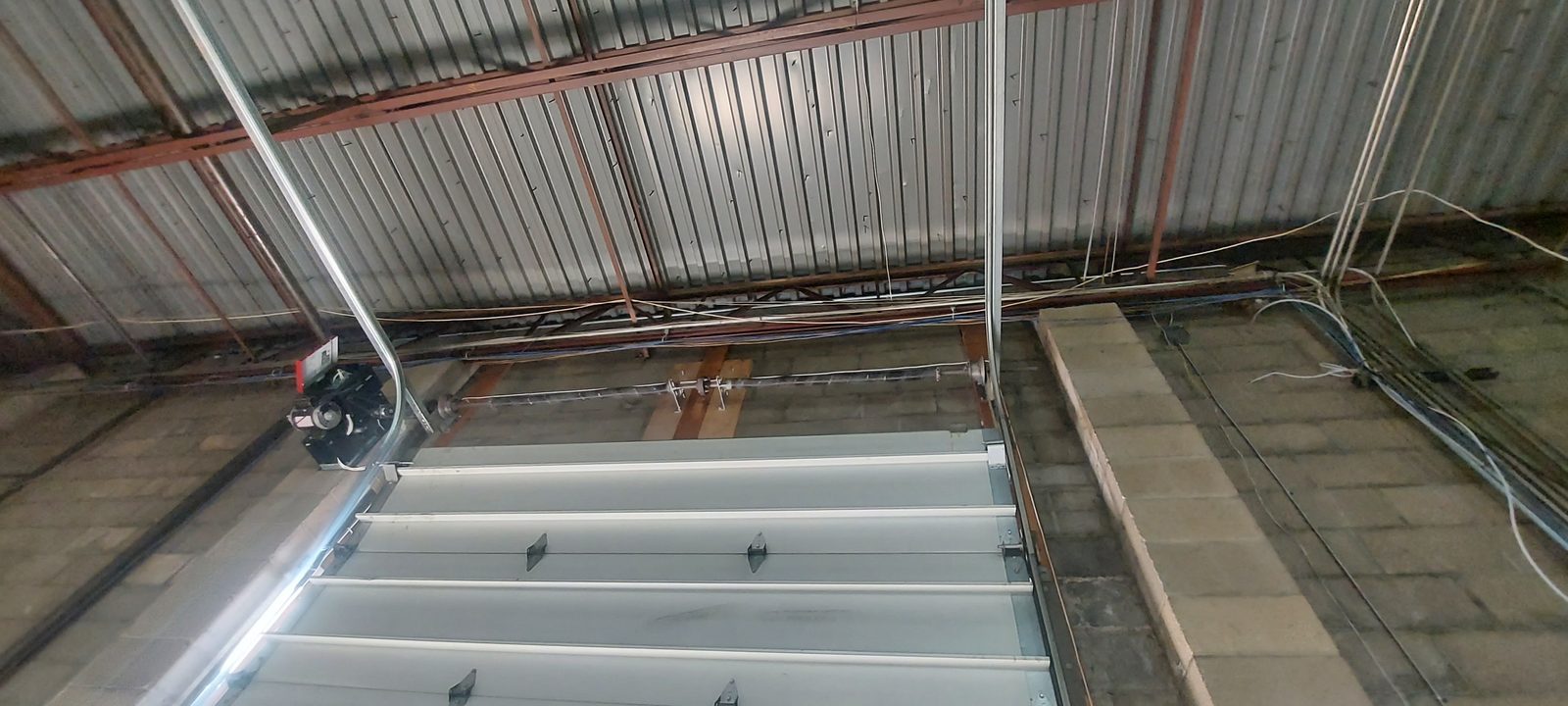 Commercial overhead door serviced by Proactive Garage Door Repair, photo 4