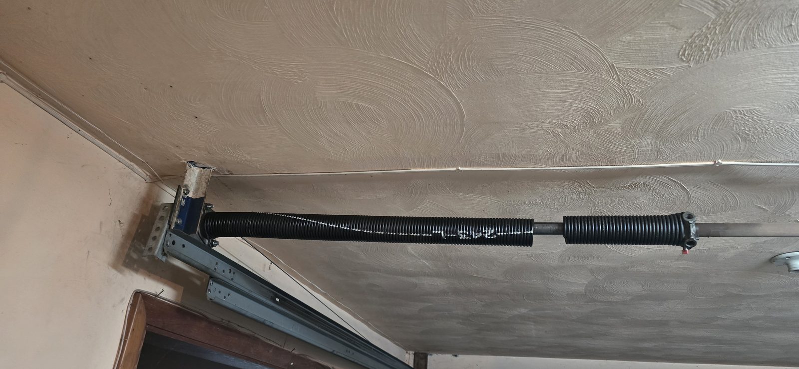 Garage door spring repair by Proactive Garage Door Repair