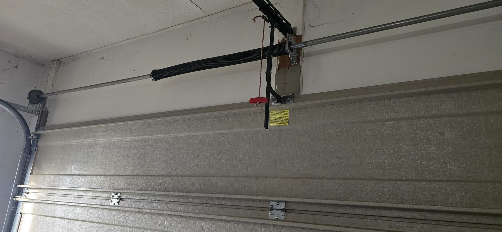 Garage door spring replacement job by Proactive Garage Door Repair