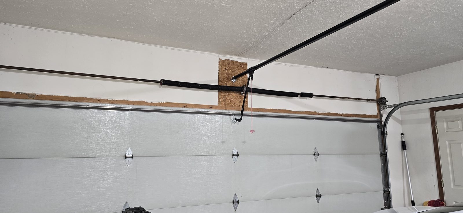 Garage door springs replaced and adjusted by Proactive Garage Door Repair