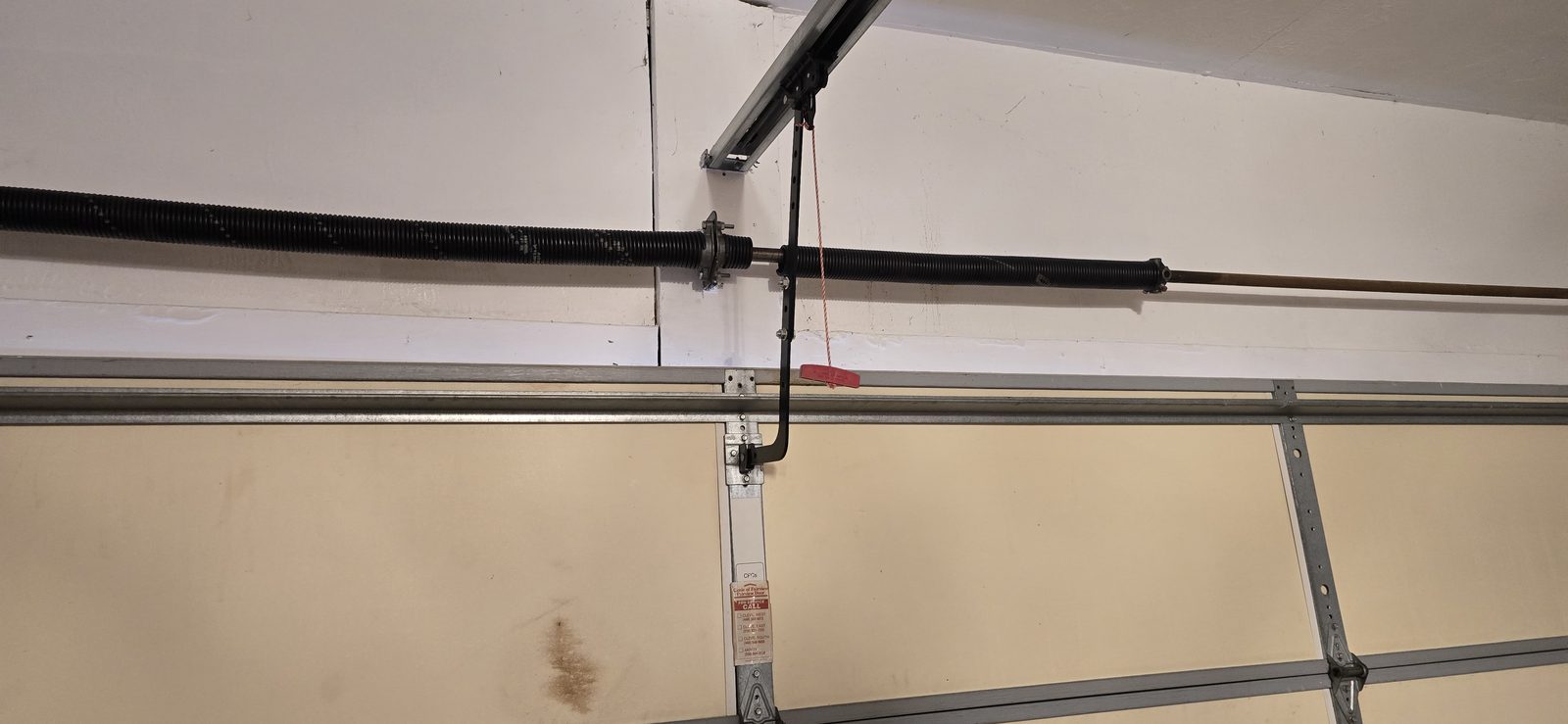 Garage door springs replaced and adjusted by Proactive Garage Door Repair
