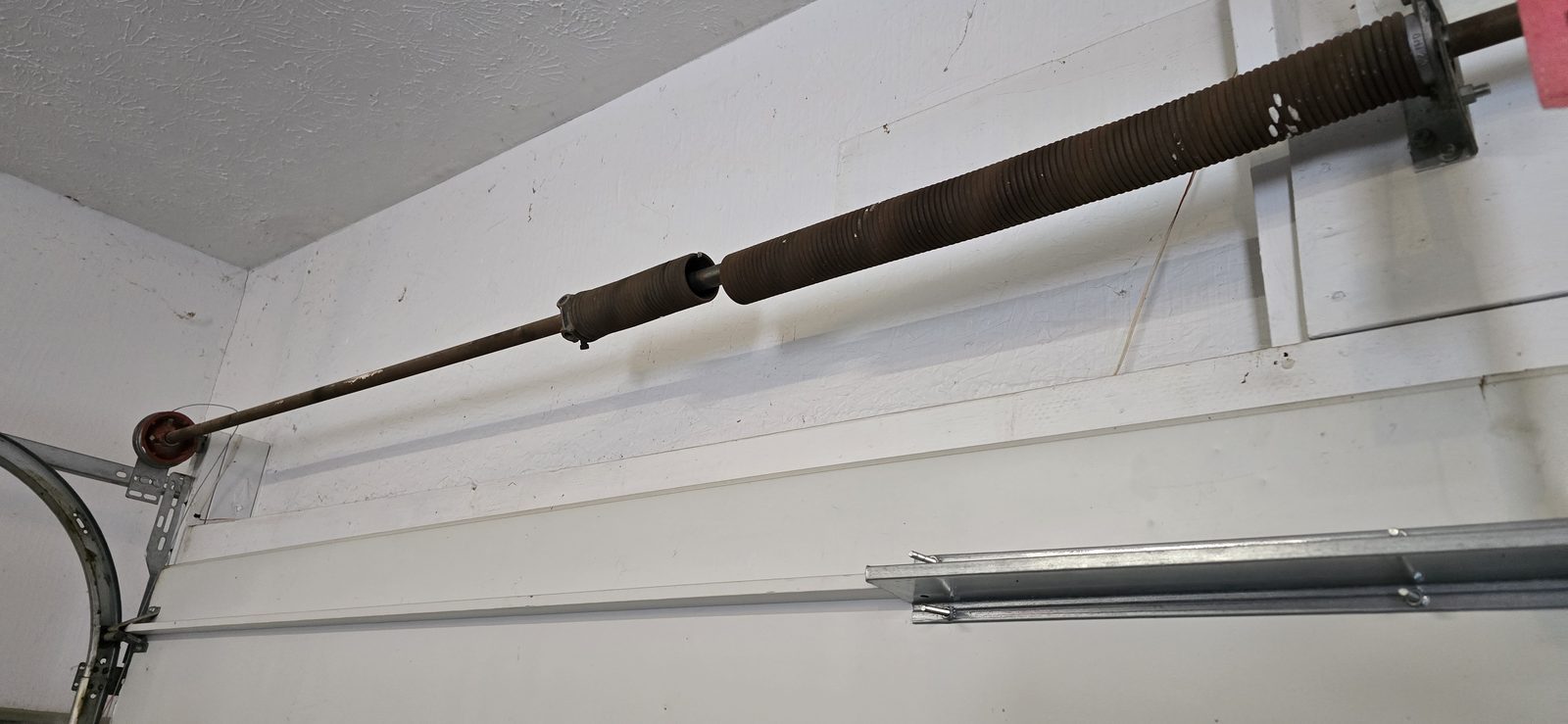 Garage door springs replaced and adjusted by Proactive Garage Door Repair