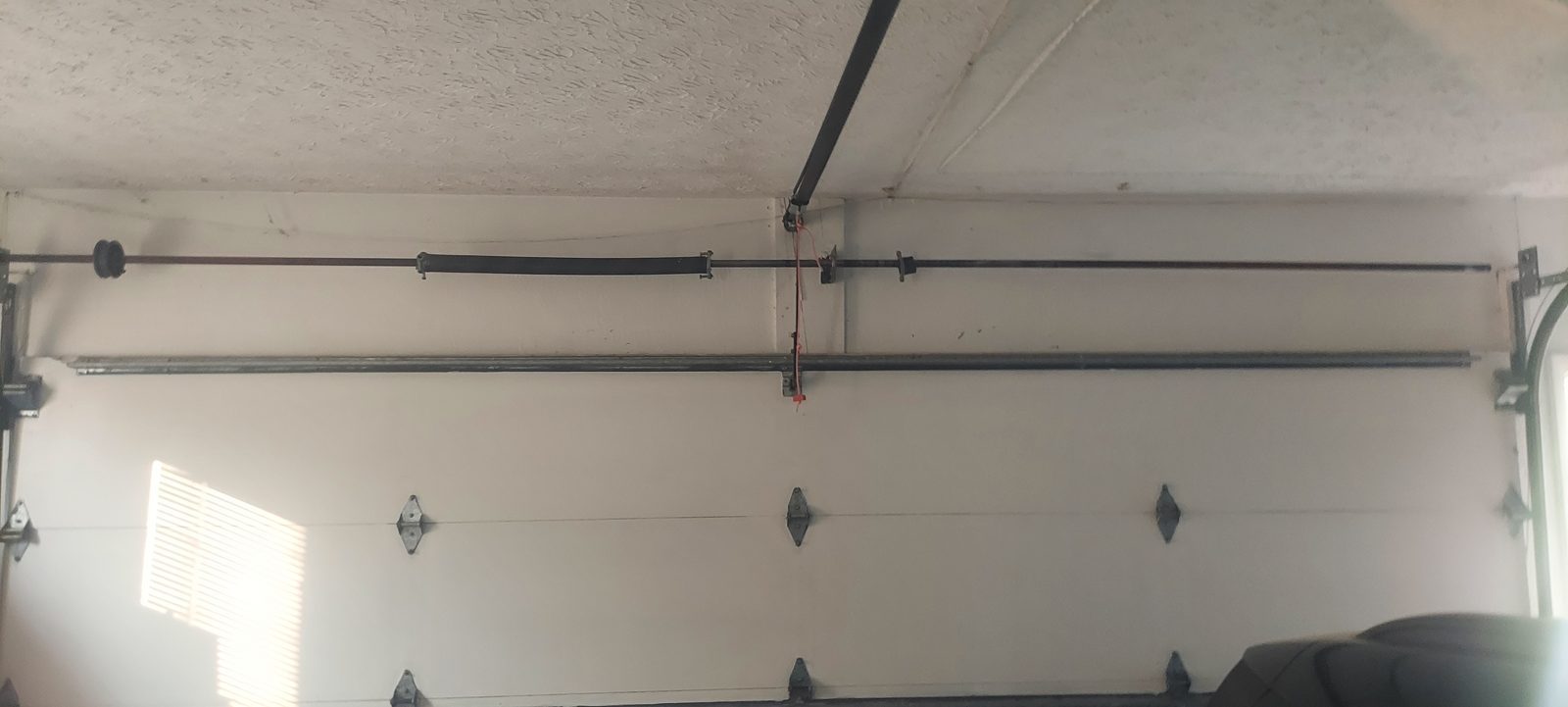 Garage door springs replaced and adjusted by Proactive Garage Door Repair, photo 2