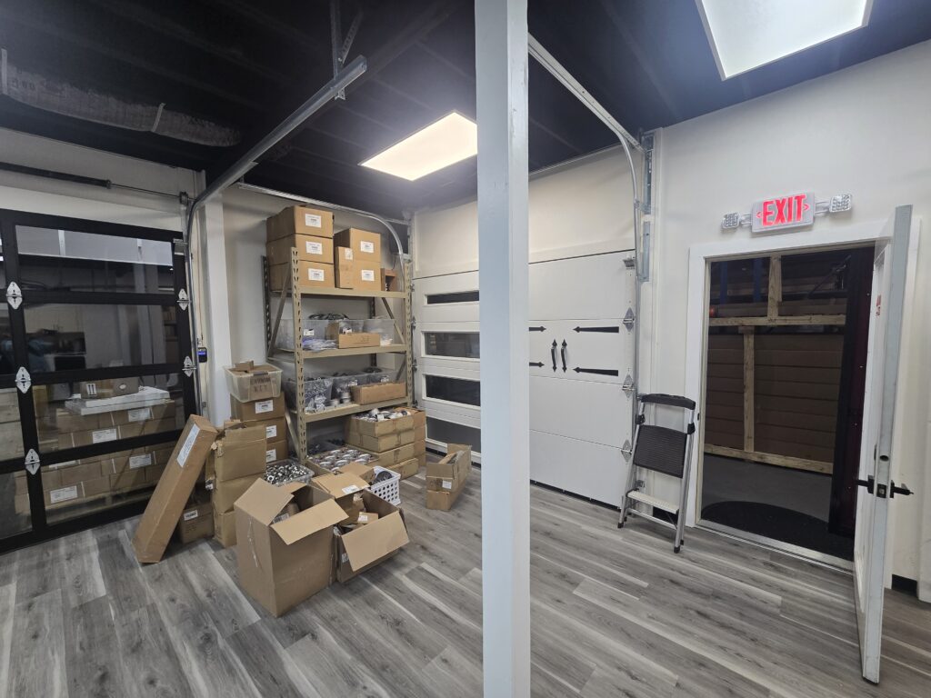 Garage door showroom with door samples at Proactive Garage Door Repair