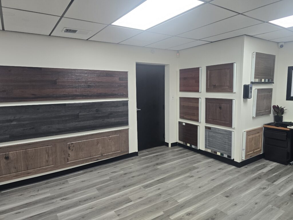 Garage door wood-look and color section samples on display at Proactive Garage Door Repair