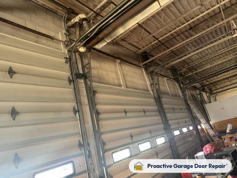 Commercial overhead sectional door serviced by Proactive Garage Door Repair