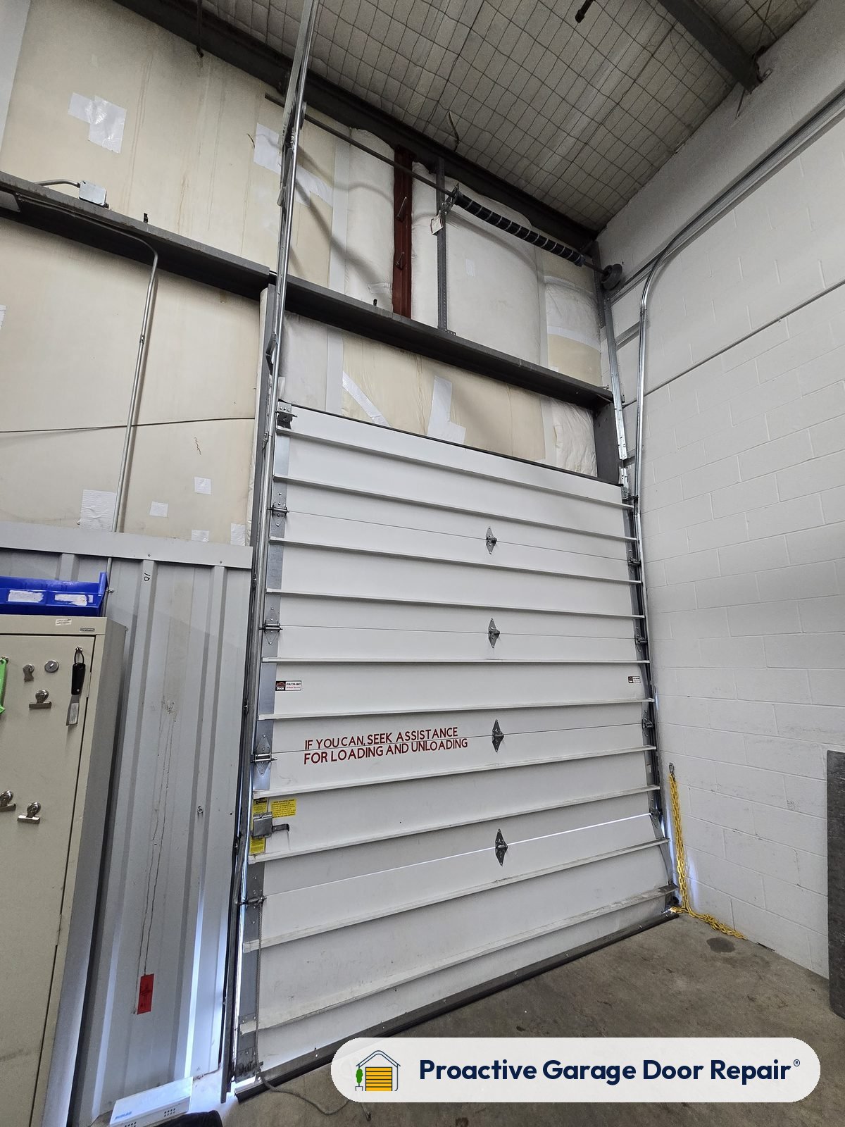 Commercial overhead door serviced by Proactive Garage Door Repair