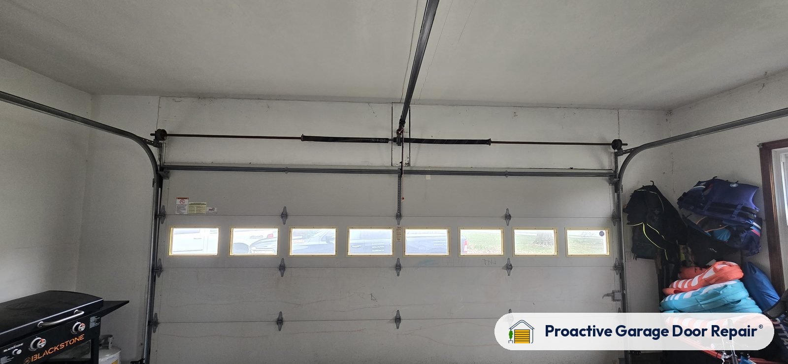 Garage door springs, tracks and hardware serviced by Proactive Garage Door Repair