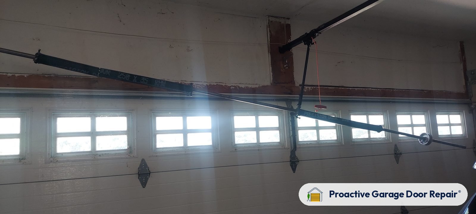 Garage door springs, tracks and hardware serviced by Proactive Garage Door Repair