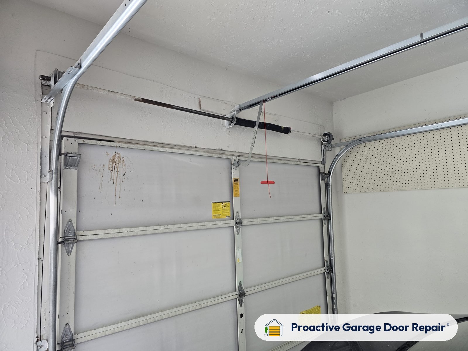 Garage door springs, tracks and hardware serviced by Proactive Garage Door Repair, photo 3