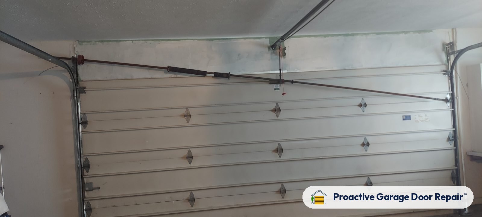 Garage door springs, tracks and hardware serviced by Proactive Garage Door Repair, photo 2