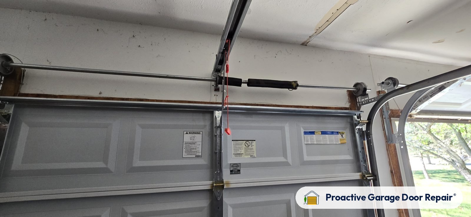 Garage door springs, tracks and hardware serviced by Proactive Garage Door Repair, photo 2