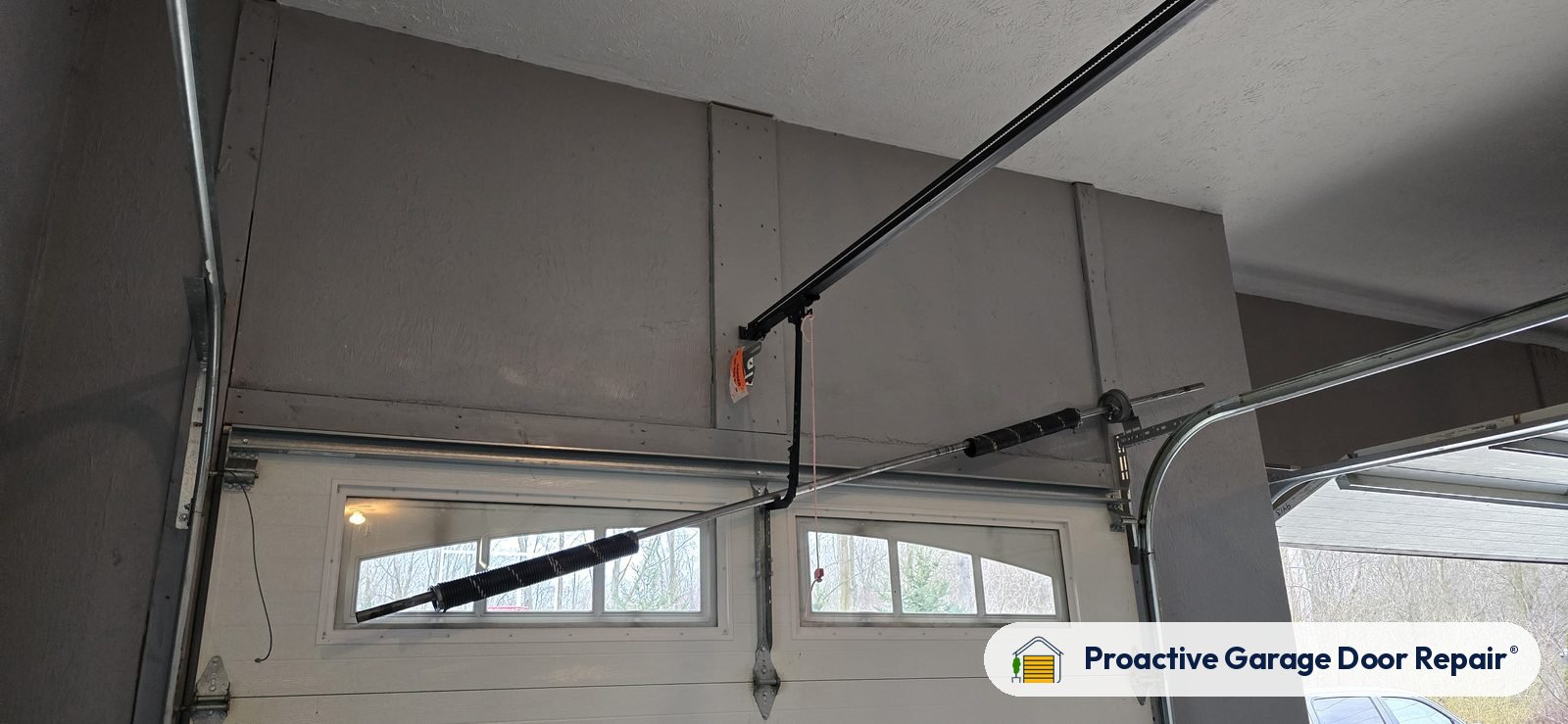 Garage door springs, tracks and hardware serviced by Proactive Garage Door Repair