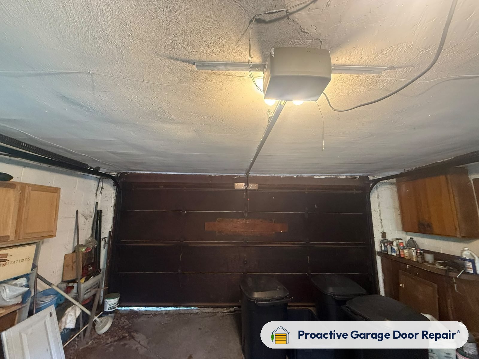 Garage door opener and rail in a customer garage, Proactive Garage Door Repair job