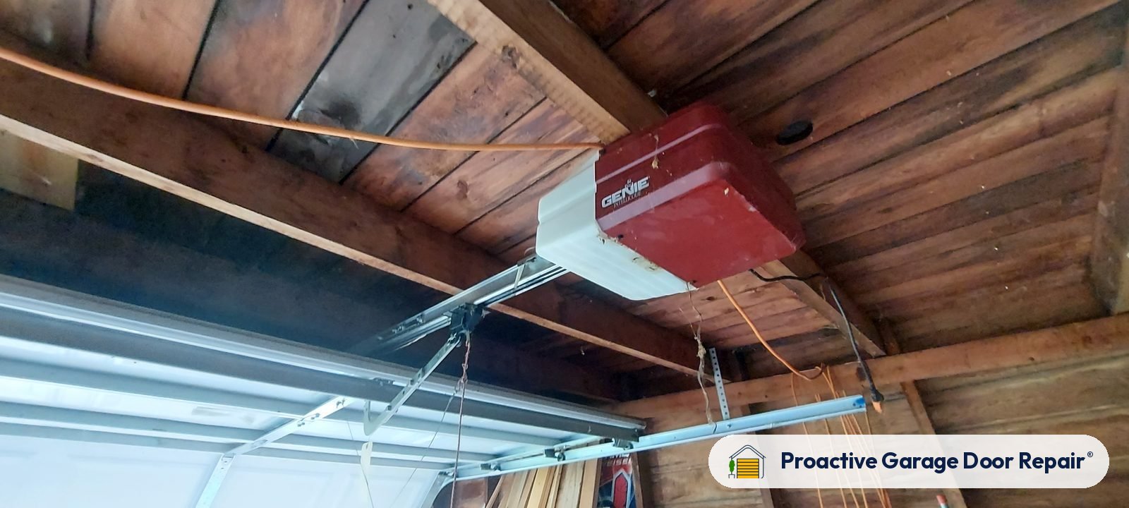 Garage door opener and rail in a customer garage, Proactive Garage Door Repair job, photo 2