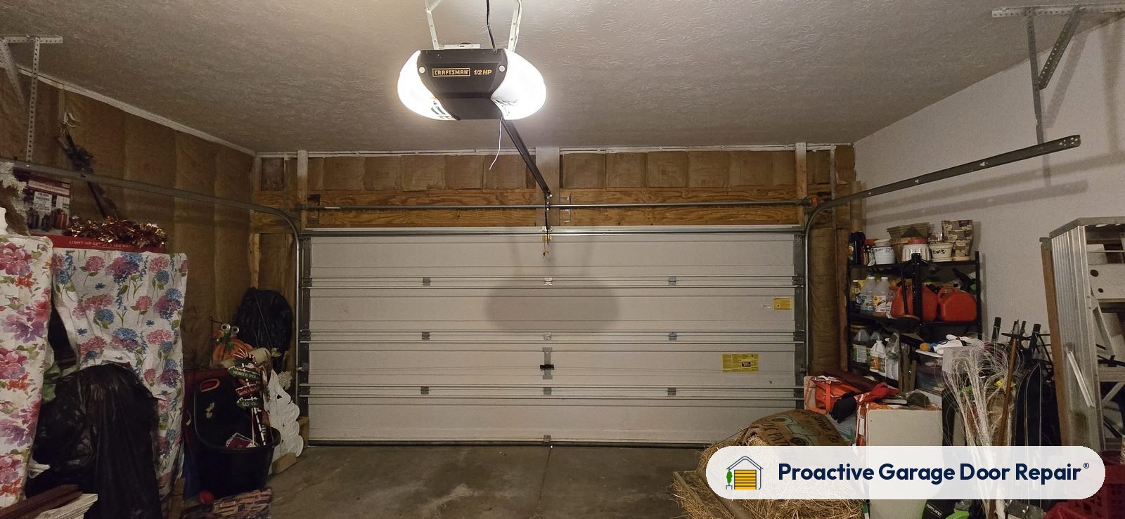 Garage door opener and rail in a customer garage, Proactive Garage Door Repair job