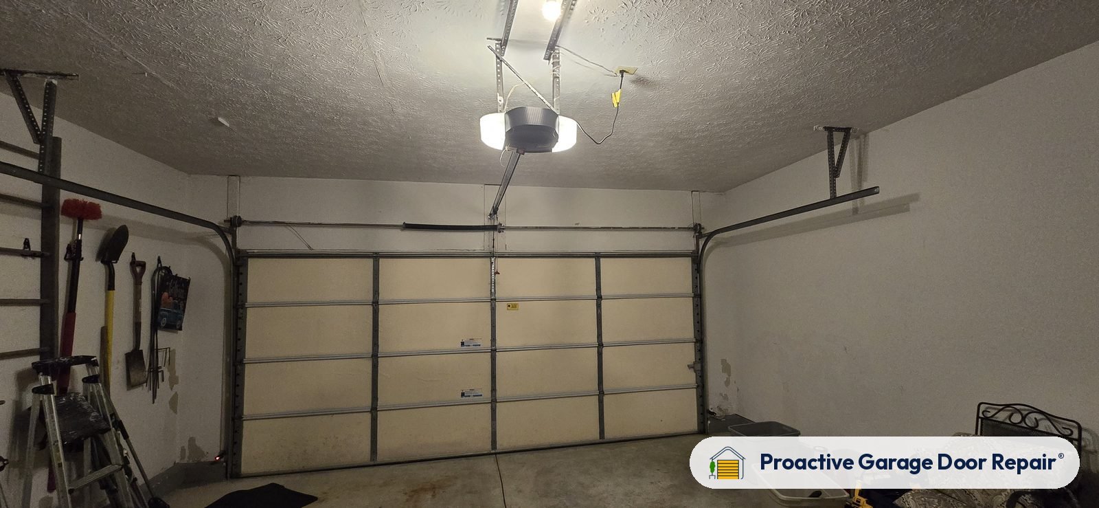 Garage door opener and rail in a customer garage, Proactive Garage Door Repair job