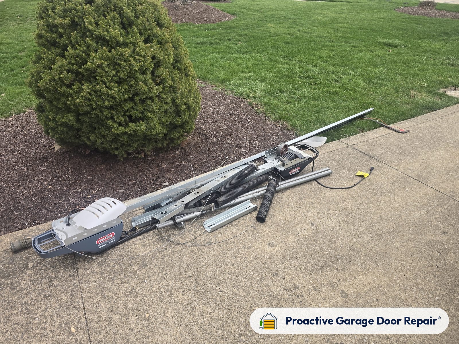 Garage door opener and rail in a customer garage, Proactive Garage Door Repair job