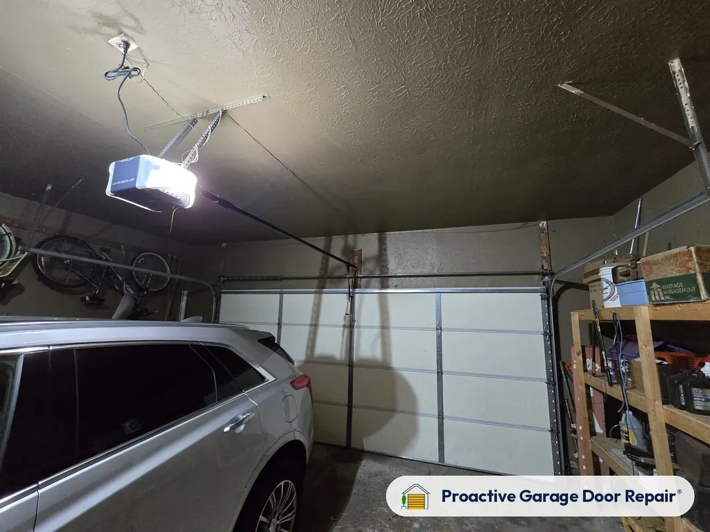 Garage door opener and rail in a customer garage, Proactive Garage Door Repair job