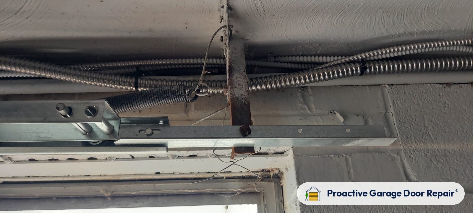 Garage door spring repair by Proactive Garage Door Repair, photo 2