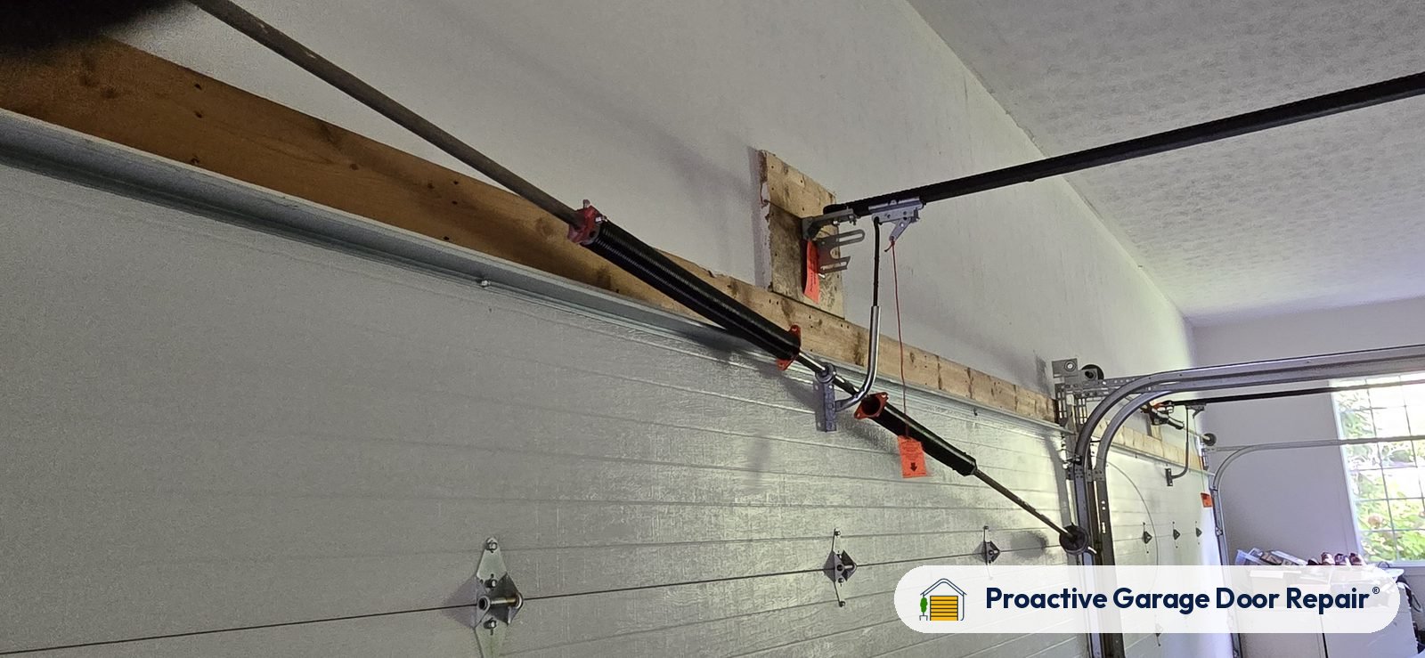 Garage door spring repair by Proactive Garage Door Repair