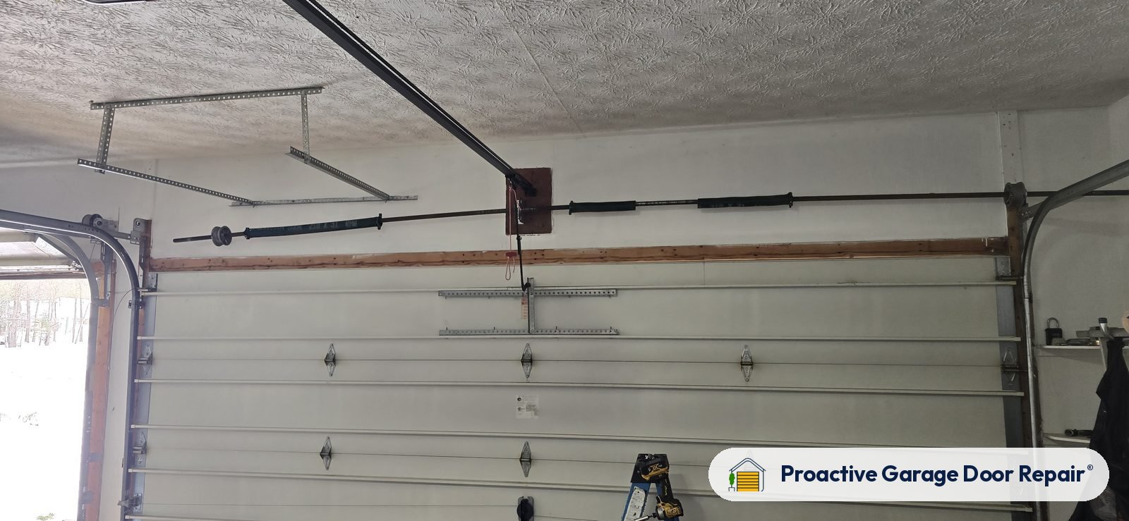 Garage door spring repair by Proactive Garage Door Repair