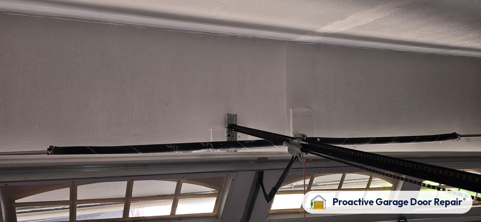 Garage door spring repair by Proactive Garage Door Repair