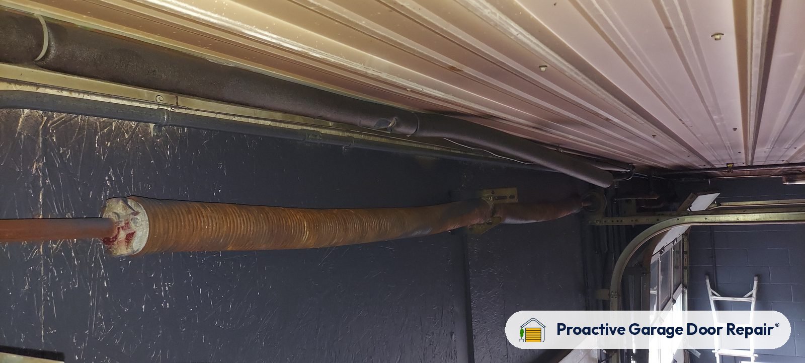 Garage door spring repair by Proactive Garage Door Repair in Massillon, Ohio