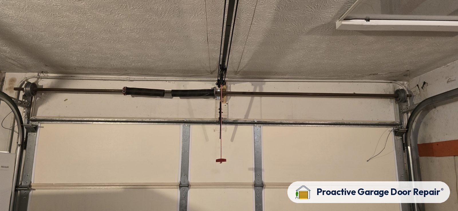 Garage door spring repair by Proactive Garage Door Repair