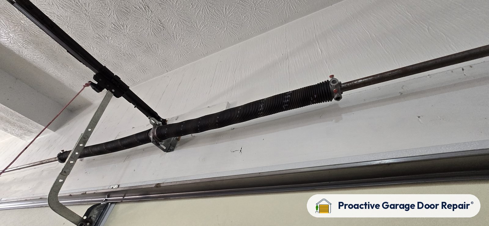 Garage door springs replaced and adjusted by Proactive Garage Door Repair