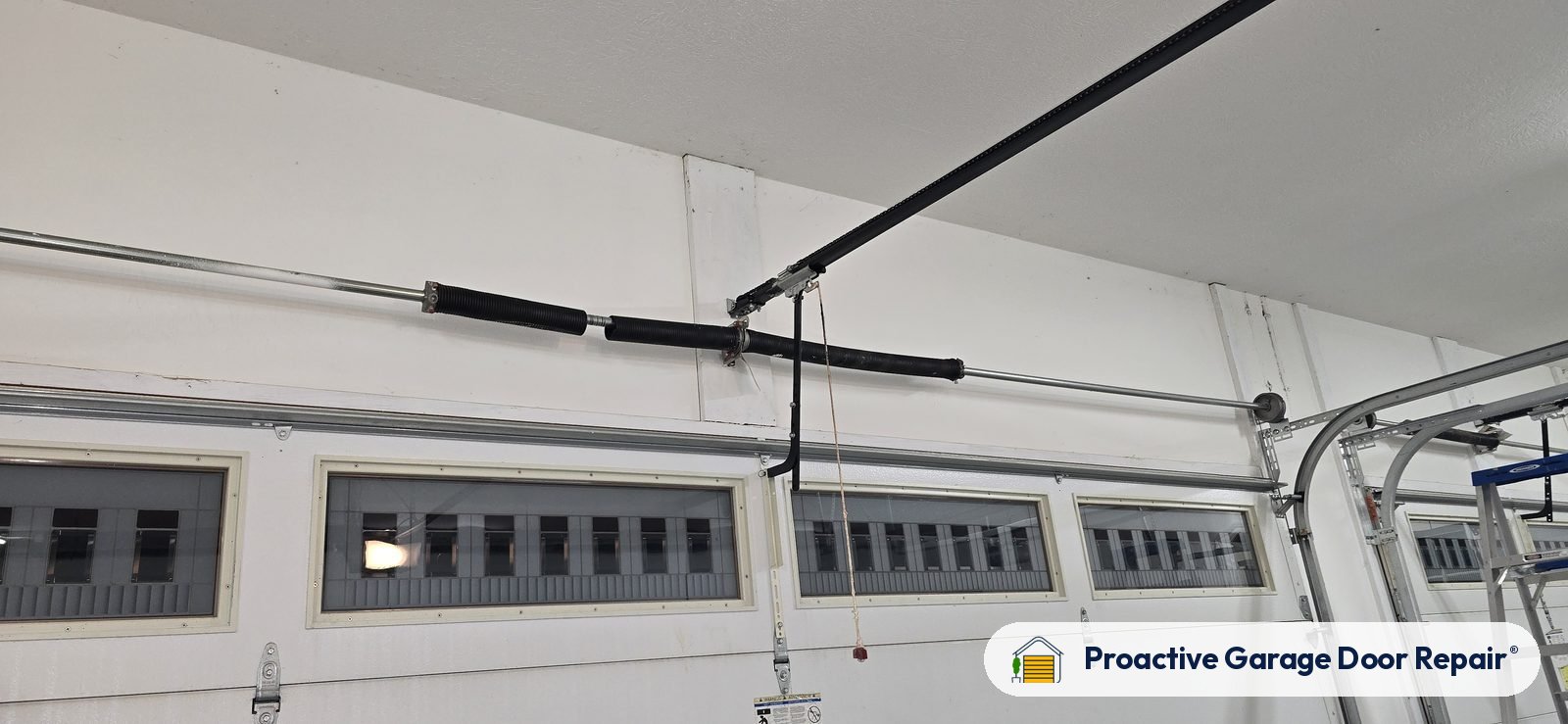 Garage door springs replaced and adjusted by Proactive Garage Door Repair