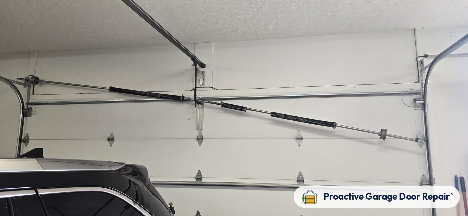 Garage door springs replaced and adjusted by Proactive Garage Door Repair