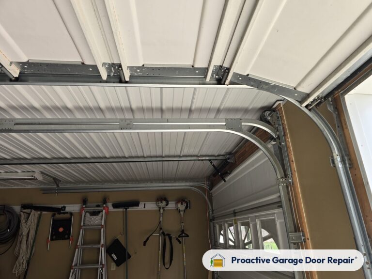 Garage door track, rollers and hinges, Proactive Garage Door Repair job, photo 2