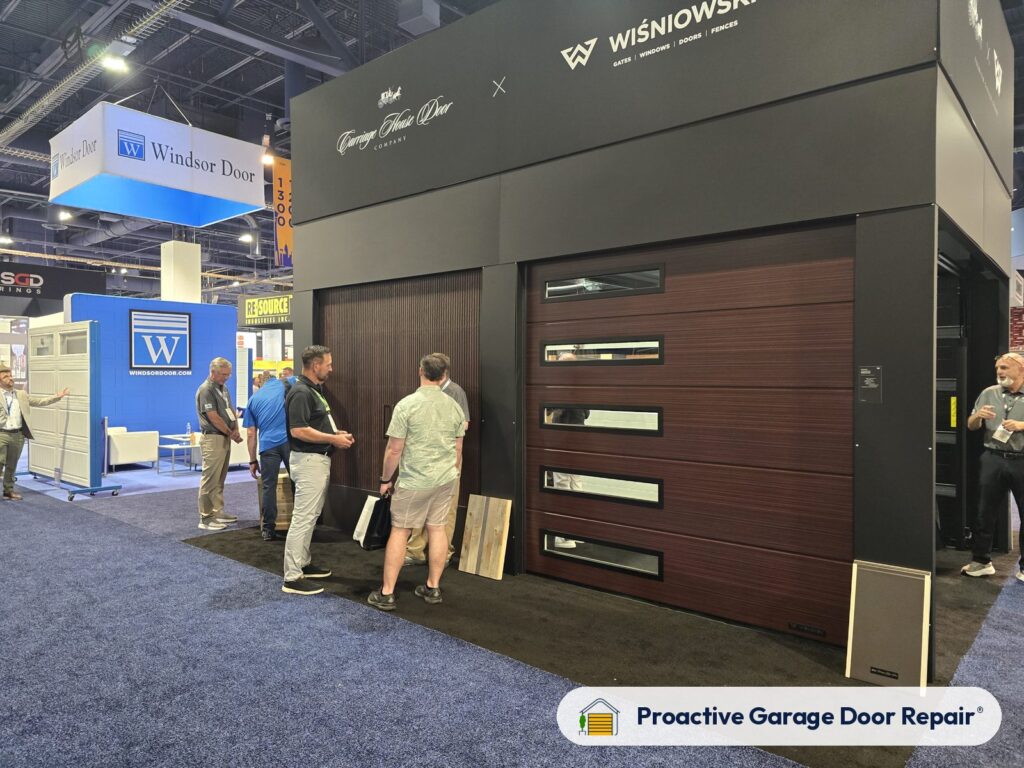 Dark wood-look modern garage door with long horizontal windows at the IDA Expo 2026